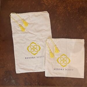 Kendra Scott Cream Pouches with Yellow Tassels